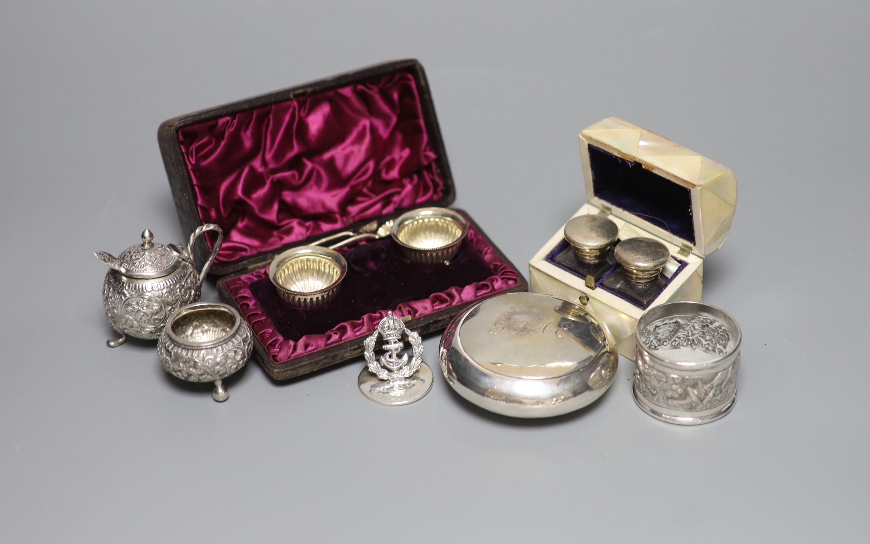 A group of small silverware, including Edwardian tobacco box, London, 1902, a cased pair of salts and a menu holder and other white metal items including Indian.